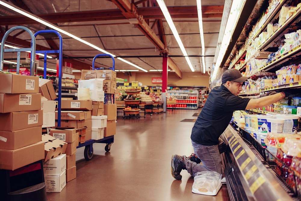 Grocery Store Employees. Store Employee. Cleaning Stores in the Retail industry. Employee of the trading Floor in the Store.